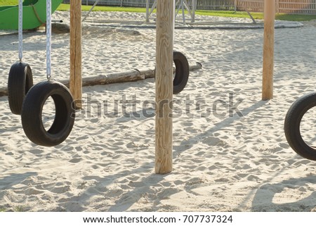 Swing of the tire on the chain of children's swing