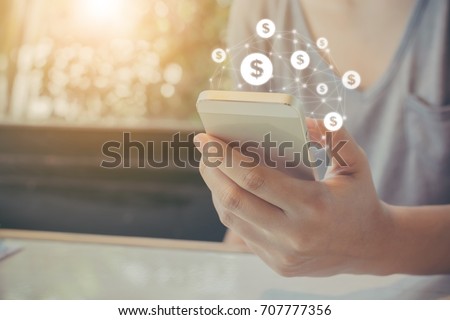 Asian woman hand using mobile phone with online transaction application, Concept financial technology (fintech) Royalty-Free Stock Photo #707777356