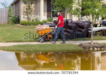 Houses in Houston suburb flooded from Hurricane Harvey 2017 Royalty-Free Stock Photo #707781394