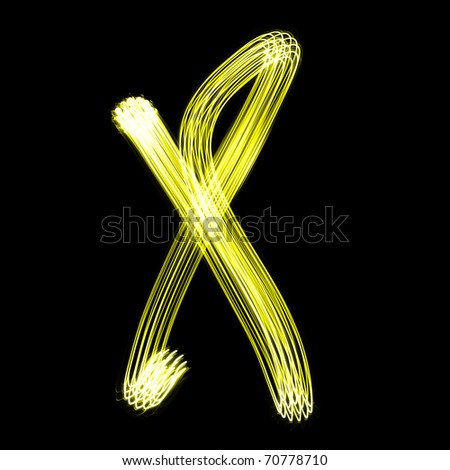 X - Created by light alphabet over black background