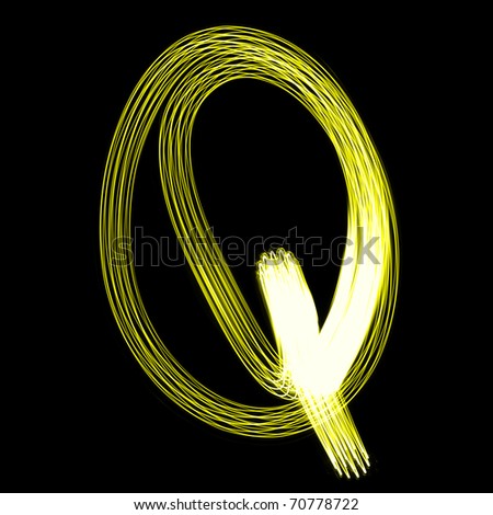 Q - Created by light alphabet over black background