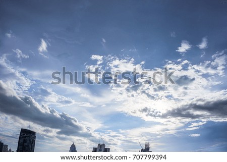 city building with beautiful shining cloud