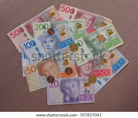 Swedish Krona banknotes and coins (SEK), currency of Sweden Royalty-Free Stock Photo #707837041