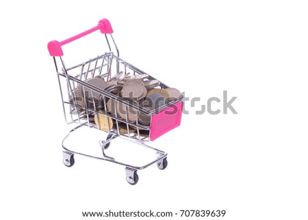 Shopping cart with money inside. Concept of money and economy of the consumer.