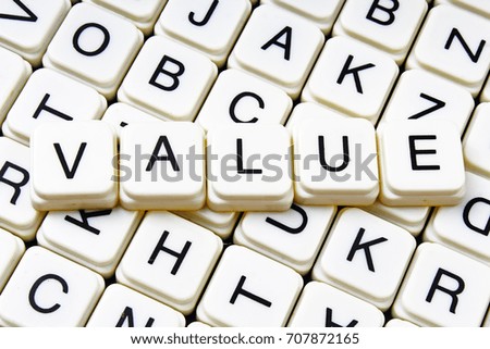 Value  text word crossword. Alphabet letter blocks game texture background.