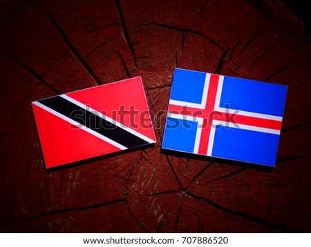 Trinidad and Tobago flag with Icelandic flag on a tree stump isolated