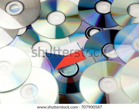 Czech flag on top of CD and DVD pile isolated on white