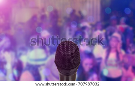 Microphone over the Abstract blurred photo of party background,Thank you party concept,Public speaking,Small Business training concept