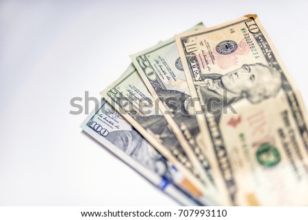 Collection of us dollar bills. Isolated. many dollars on a white background isolated. Dollars seamless background. High resolution seamless texture