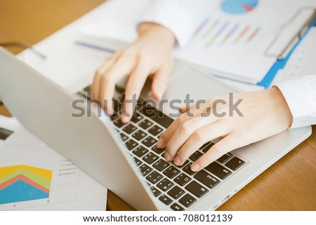 Close-up hands print job submission information. Online chat line information. On the laptop Royalty-Free Stock Photo #708012139