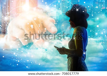 Connection concept, image of silhouette girl connection with her smartphone over the blue sky.