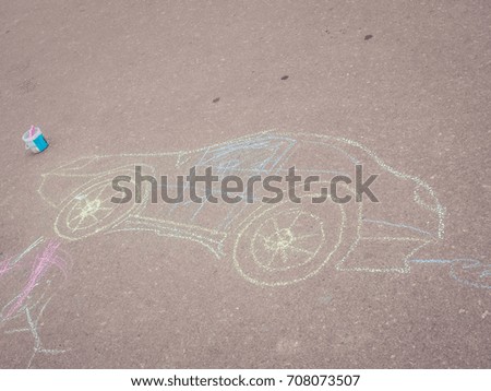 Car chalk on asphalt