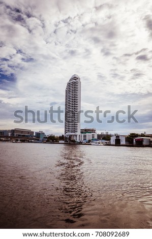  High skyscraper on the border of the river in Bangkok