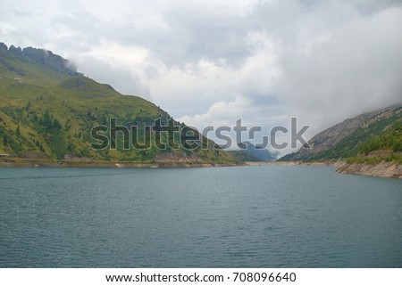beautiful lago fedaia lake in dolomites at marmolada