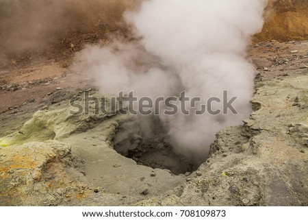 Yellow fumaroles and volcanic rocks. Kamchatka Peninsula