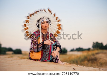 American Indian girl sitting in yoga pose