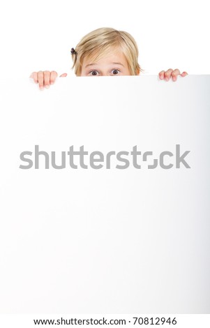 cute little girl behind white board with funny facial expression
