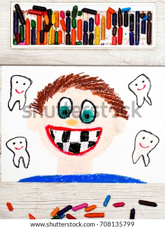 Photo of colorful drawing: Smiling boy without milk teeth.  Losing baby teeth.