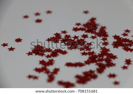red small stars lying in the studio