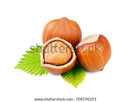 Hazelnuts with leaves isolated on white background Royalty-Free Stock Photo #708190291