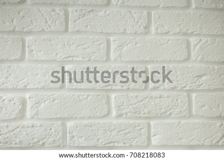 under the white wall brick decoration