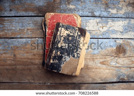 Vintage old books on wooden background