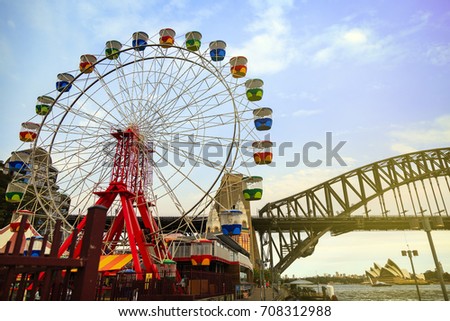 Colourful ferris wheel carriages at an amusement park Sydney Australia
 Royalty-Free Stock Photo #708312988