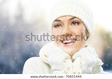 a beauty girl on the winter background