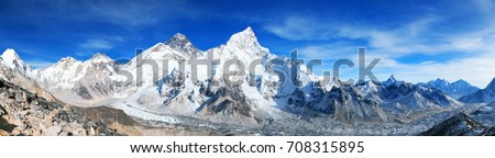 Panoramic blue colored view of himalayas mountains, Mount Everest and Khumbu Glacier from Kala Patthar - way to Everest base camp, Khumbu valley, Sagarmatha national park, Nepalese himalayas
 Royalty-Free Stock Photo #708315895