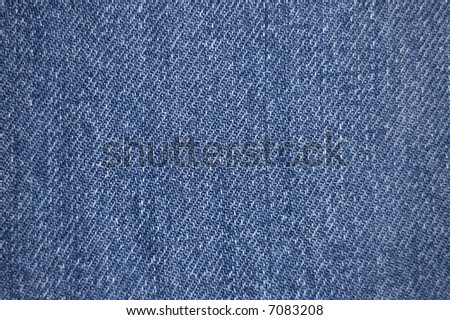 Distressed blue denim fabric texture
