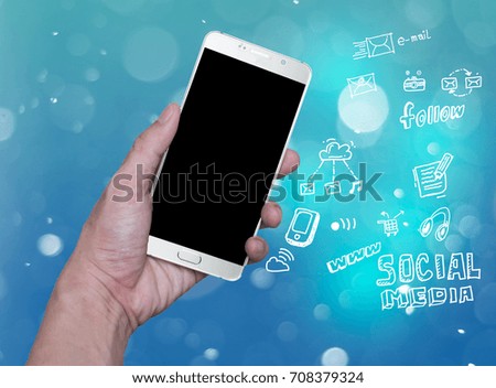 hand holding mobile phone with cloud computing with blue background  