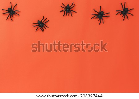 Aerial view of Happy Halloween Festival background concept.the sign of object on beautiful  orange modern rustic wooden office desk.Essential items of decoration  for the season. 