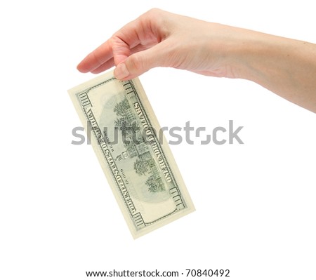 One hundred dollars in a female hand. Fingers hold paper banknote on a white background. Girl's hand with dollars isolated. Money with hand