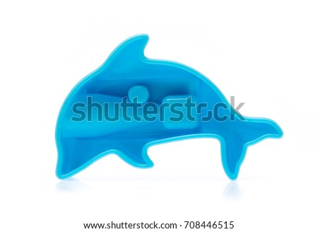 a dolphin pencil sharpener isolated on white background