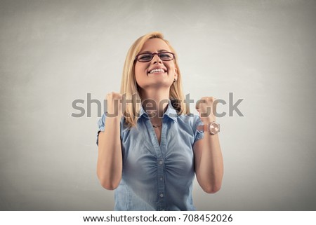 Closeup portrait happy young woman. Celebrate success concept. Human facial expression emotions feelings body language