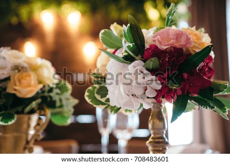 Wedding composition of fresh hydrangea flowers in the restaurant.