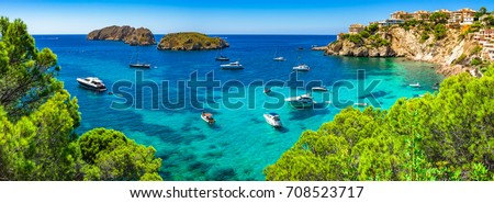 Majorca Panorama, beautiful seascape bay with luxury yachts at the coast of Santa Ponsa, Mallorca Mediterranean Sea, Balearic Islands. Royalty-Free Stock Photo #708523717