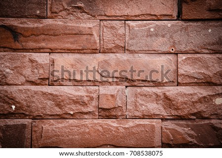 Brown limestone wall texture background.