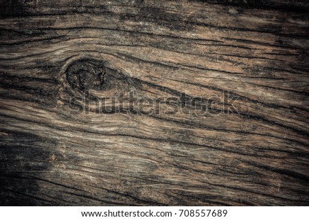 Raw wood, wooden slatted fence or lath wall background texture in vintage tone with vignetting.