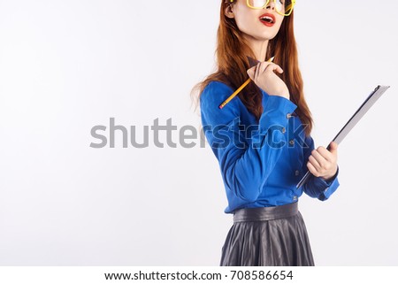 teacher wearing glasses working on a light background free space                               