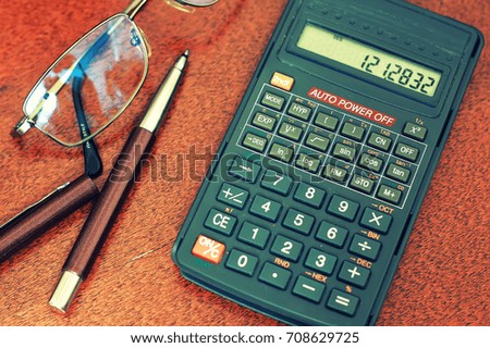 calculator table glasses 