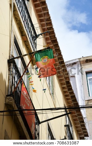 Portuguese flag in the old Alfama district of Lisbon