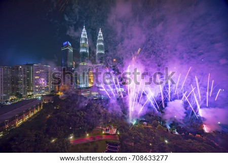 Fireworks display show over Kuala Lumpur city skyline Royalty-Free Stock Photo #708633277
