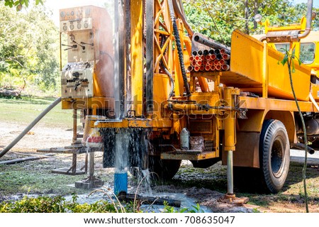 Ground water hole drilling machine installed on the old truck in Thailand. Ground water well drilling. Royalty-Free Stock Photo #708635047