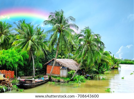 Beautiful countryside landscape with river, boat and coconut tree.
