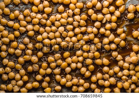 Background of chickpeas with soy sauce on parchment close-up