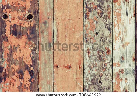 Peeled and faded plank wooden texture wallpaper. Tiled. 