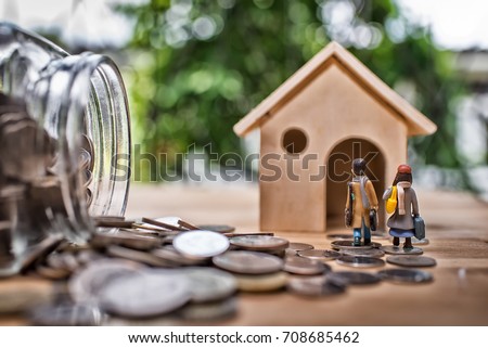 Mortgage concept. Money and house High Dynamic Range tone Royalty-Free Stock Photo #708685462