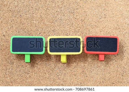 Empty wood sign on wooden cork background for input text in your want and have copy space.