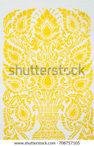 Northern Thailand gold painted on white wall background